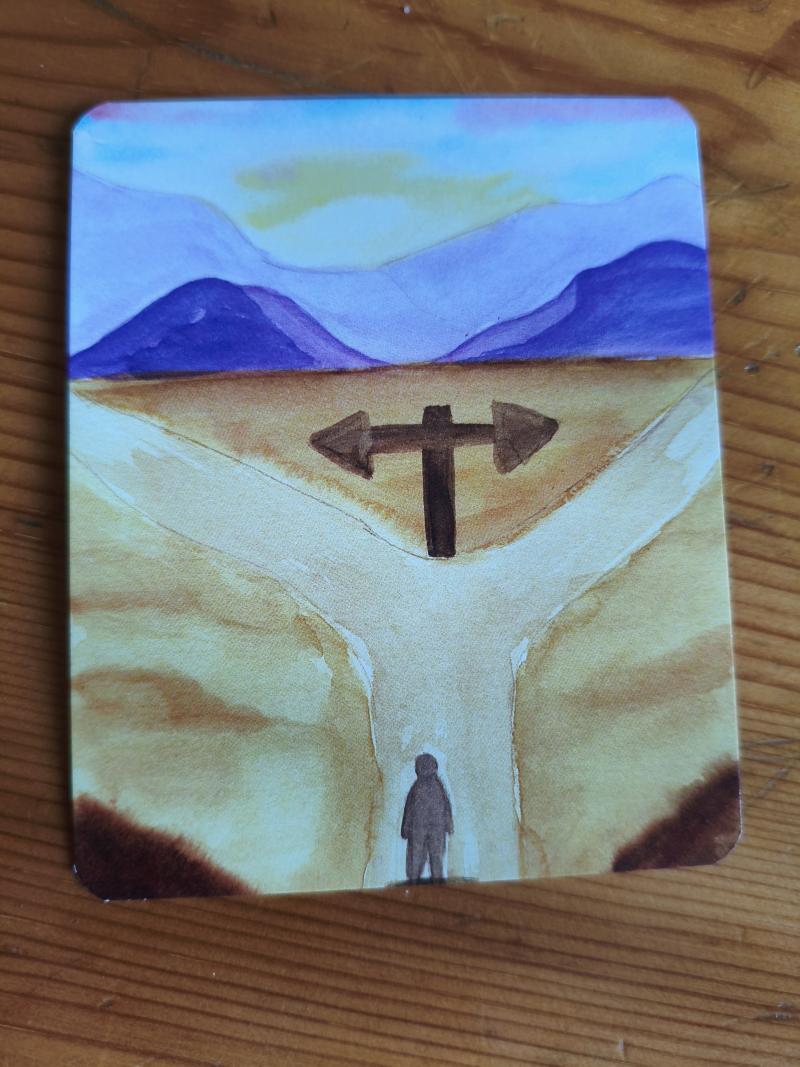 Card used in counselling with an image of a path with two options